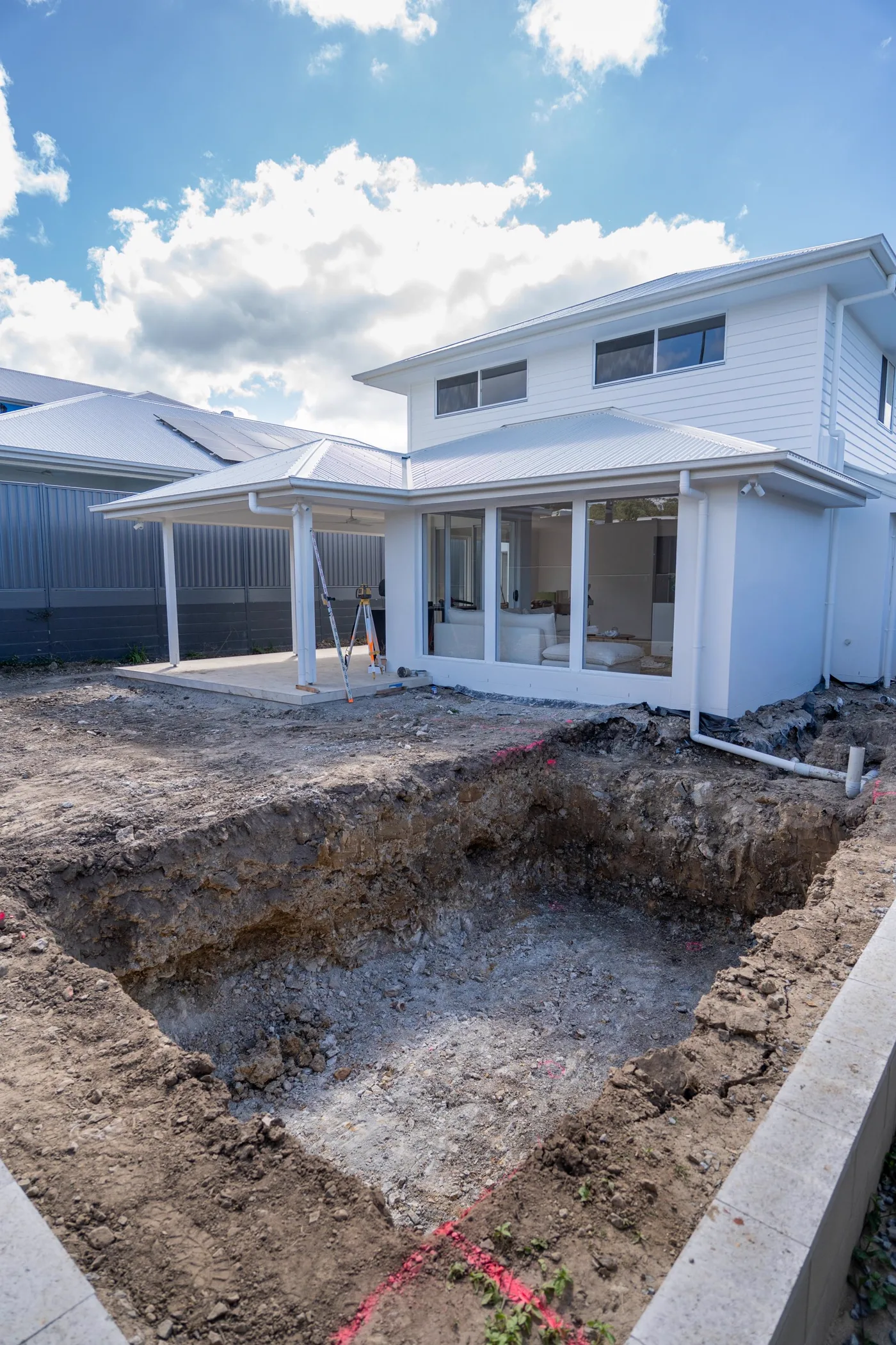 Sloping Gold Coast backyard before pool excavation began
