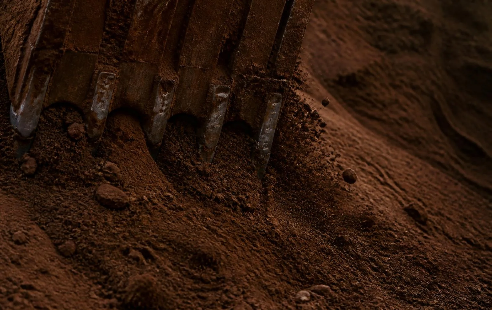 Excavated soil background behind the BD Excavation Services enquiry form